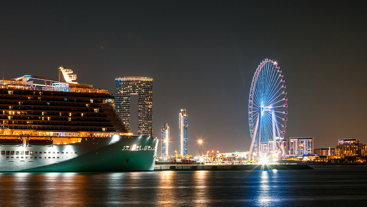 cruise slider_0002_ain-dubai-ferris-and-cruise-ship-in-dubai-at-night-2026-01-09-09-57-18-utc